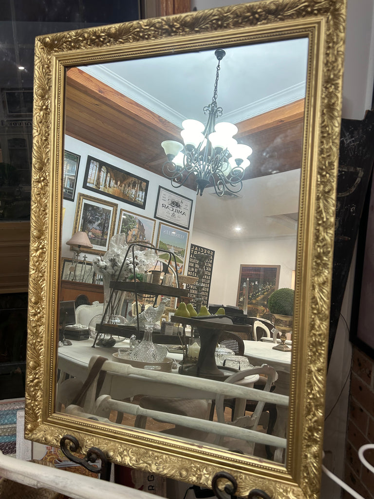 Gold framed mirror