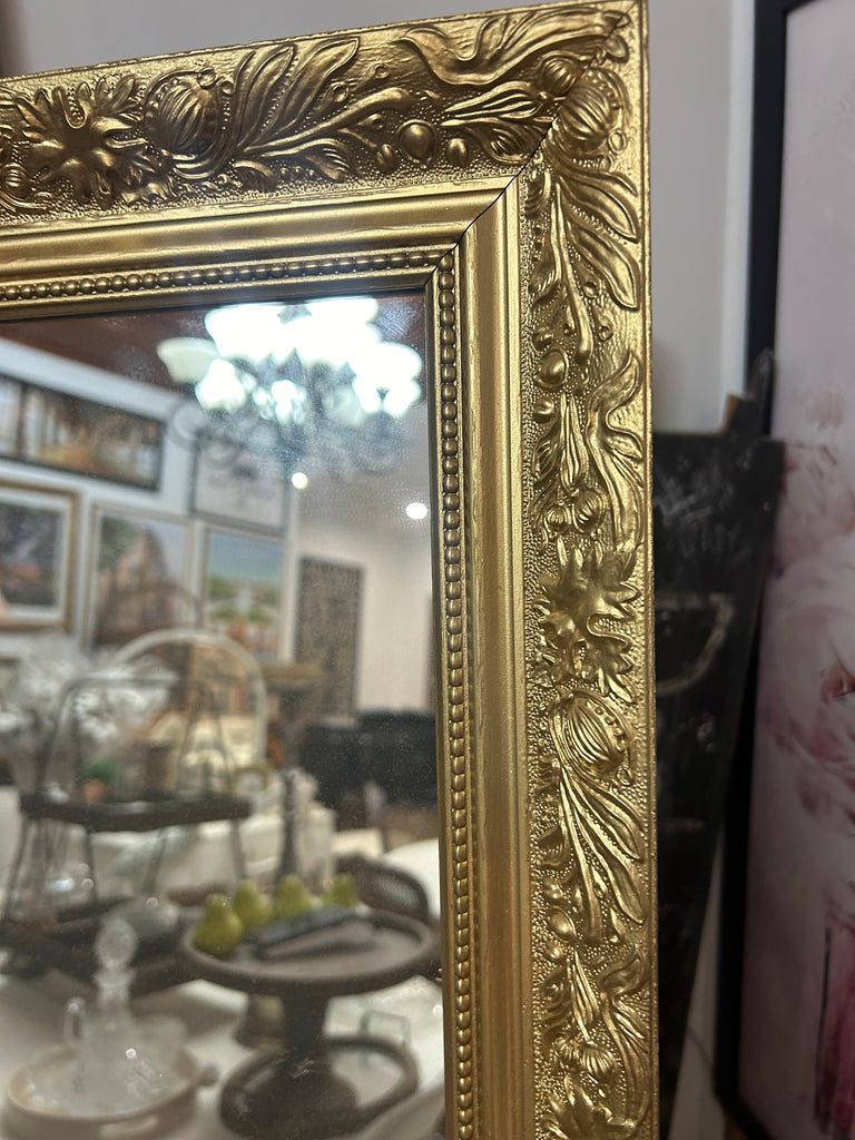 Gold framed mirror