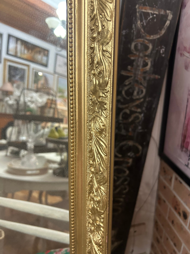 Gold framed mirror