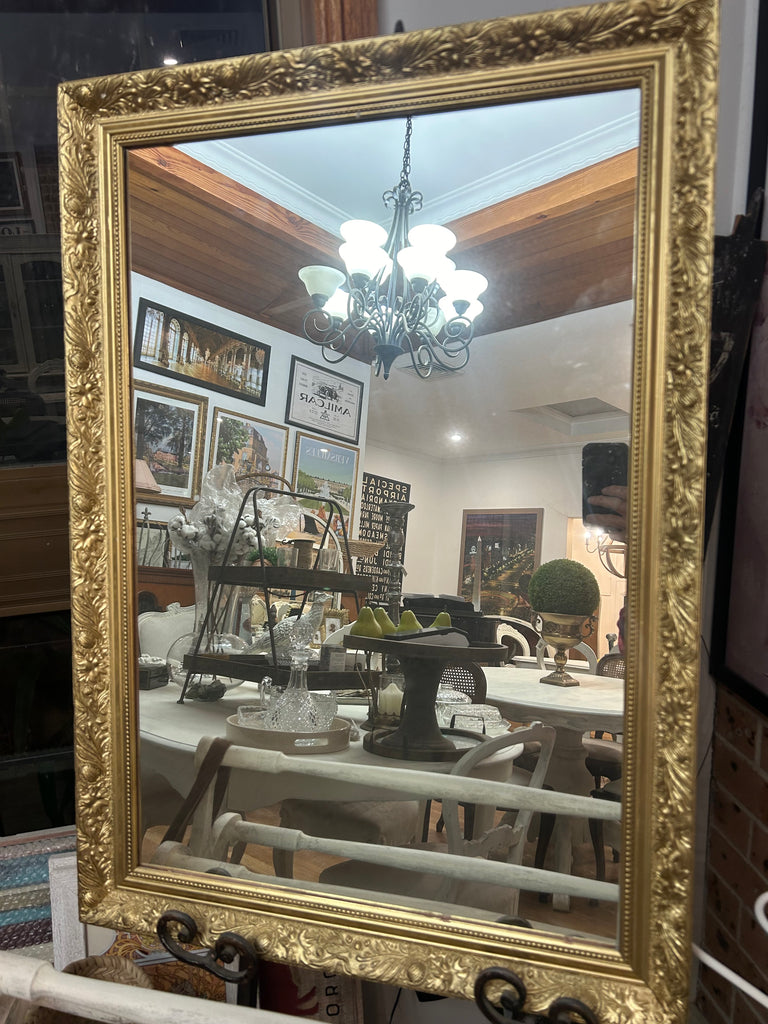 Gold framed mirror